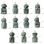 statuette bouddhiste vert clair granitée minimaliste sculptural durable extérieure intérieure ornement jardin porte bonheur