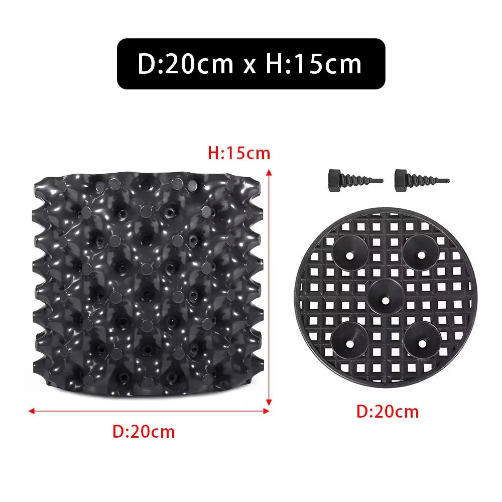 grille drainage plante noir moderne perforations circulaires différentes tailles incluses