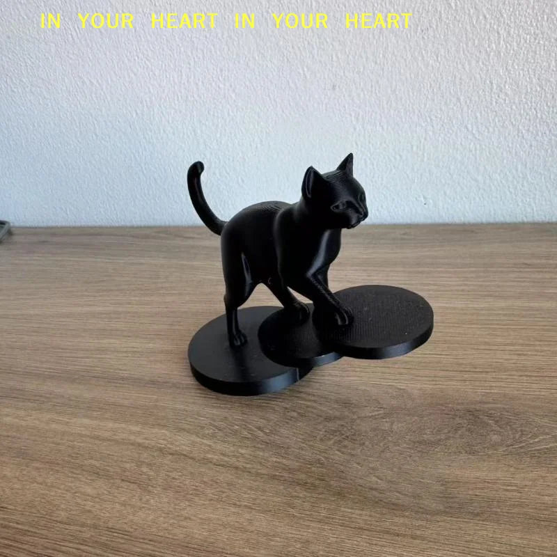 statue chat noir résine lisse contemporaine décoration intérieure base circulaire ornement salon minimaliste
