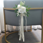 décoration mariage rose artificielle ruban eucalyptus feuilles verte chaise égliseextérieur