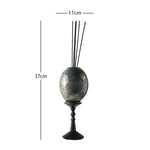 bougie décorative moderne élégante motifs floraux dorés texture ondulée marron clair noir salon diffusion