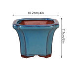 pots fleurs céramique moderne bleu brun texture grained non enduit drainage plante verte