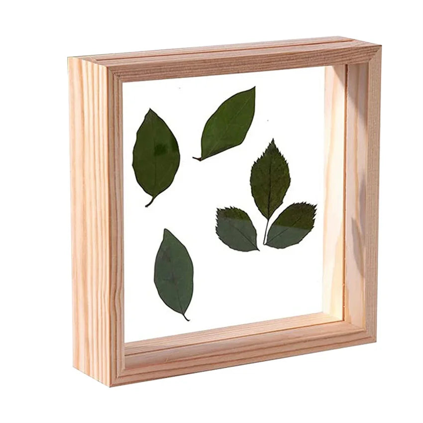 cadre photo bois double face nature morte feuilles brindilles ours peluche minimaliste deco maison