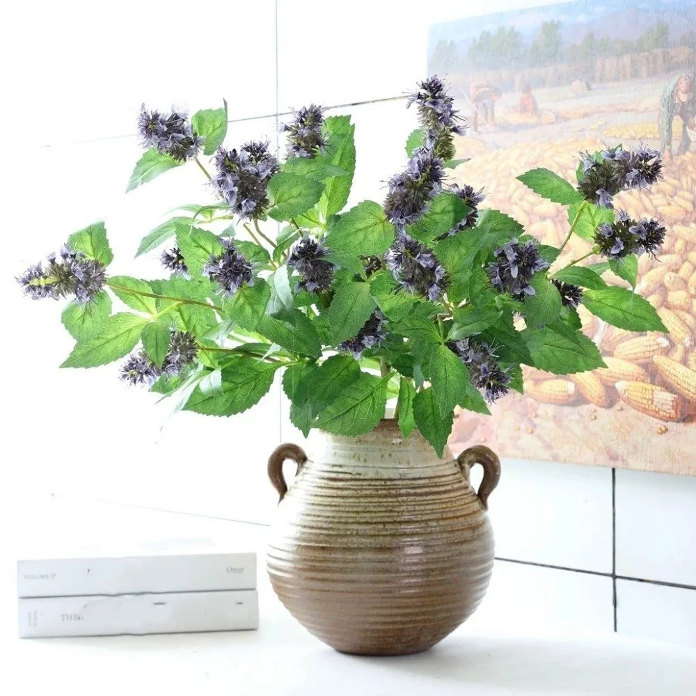 Bouquet artificiel moderne feuilles vertes fleurs violettes blanches décoration intérieure vase vert violet blanc