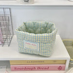 panier rangement rose clair bleu clair jaune clair marron clair carreaux blancs minimaliste imperméable