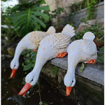 statue canard blanc plumes orange piscine jardin décoration extérieure animaux ornements paysagistes fleurs artificielles