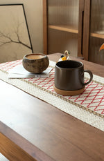 serviette table géométrique blanc rouge beige moderne ethnique