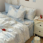 ensemble literie moderne patchwork bleu clair drap plat taies oreillers coussin decoratif