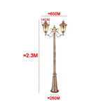 lampadaire extérieur or noir verre translucide vintage élégant détails sculptés deux lampes abat jours