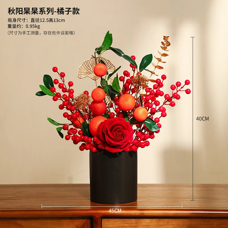 décoration intérieure moderne fleurs artificielles vase noir roses arrondies éléments dorés asiatique