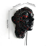 masque sculptural noir rouge texture magma lave art contemporain halloween décoration murale led usb