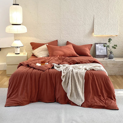 Housse de couette en coton percale turquoise sur lit
