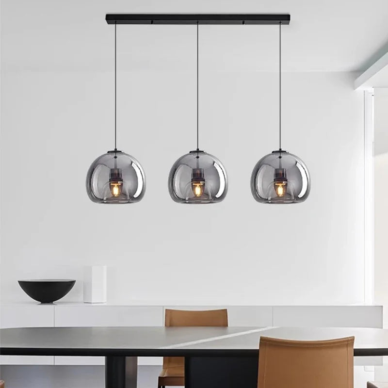 suspension pendentif noir transparent moderne têtes ambrées têtes noires flux lumineux 249 2000 autonome