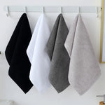 serviettes coton douces absorbantes blanc gris noir velours modernes minimalistes crochets support mural