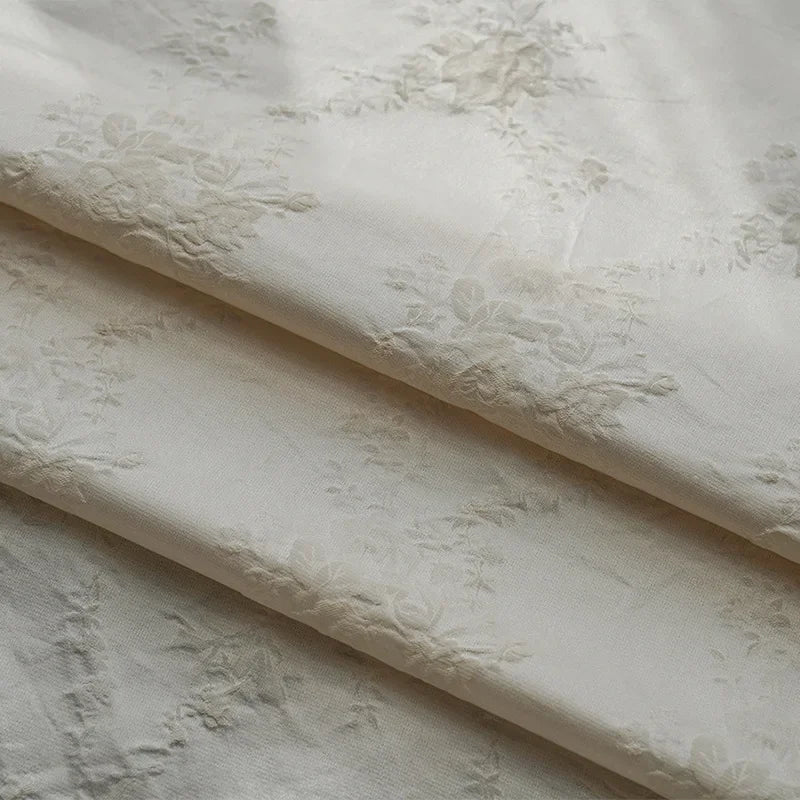 tissu blanc cassé fleurs relief polyester semi transparent classique vintage bricolage 160cm