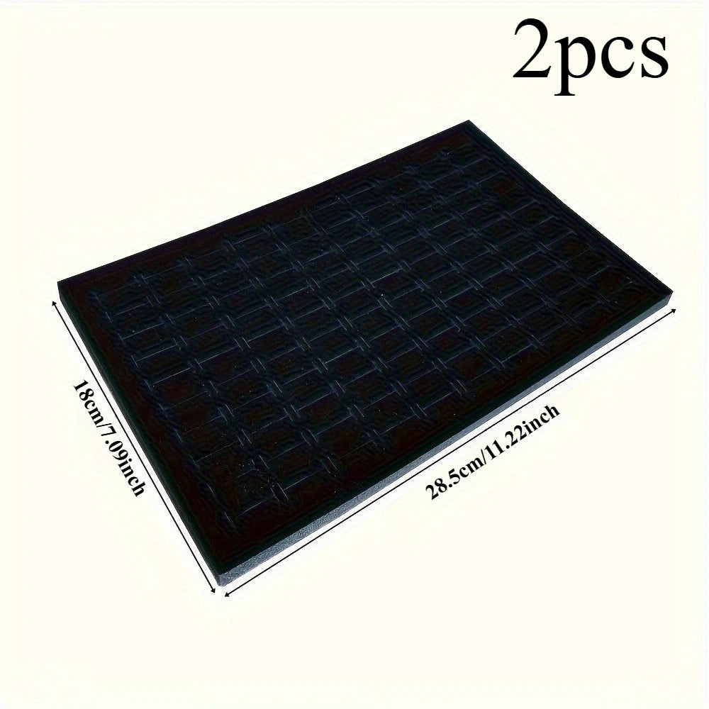 présentation moderne support bijoux velours noir lignes blanches rangement deux pièces