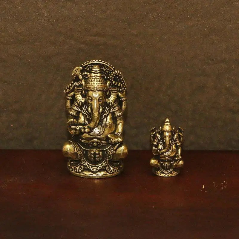 statues ganesha bronze doré détails sculptés traditionnelles indiennes ornement maison