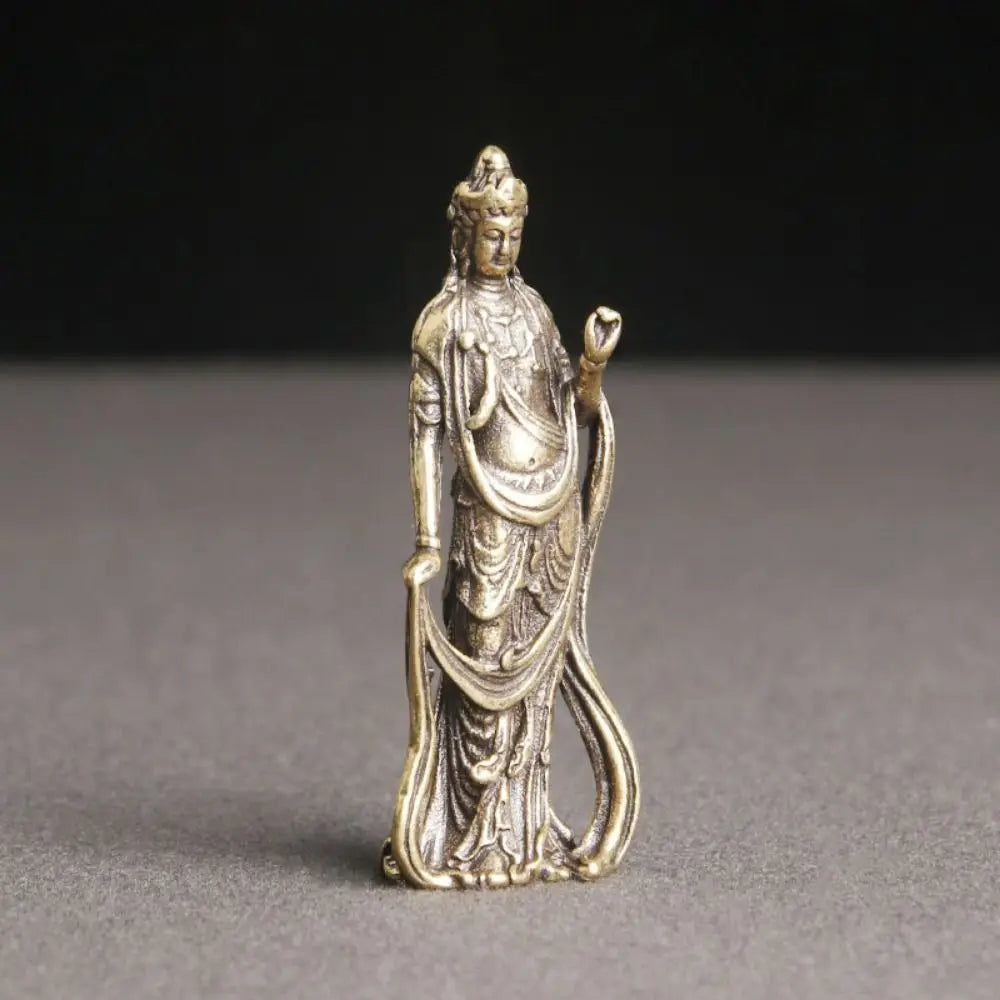 statue bouddhiste miniature dorée traditionnelle relief détails vêtements bronze religieux