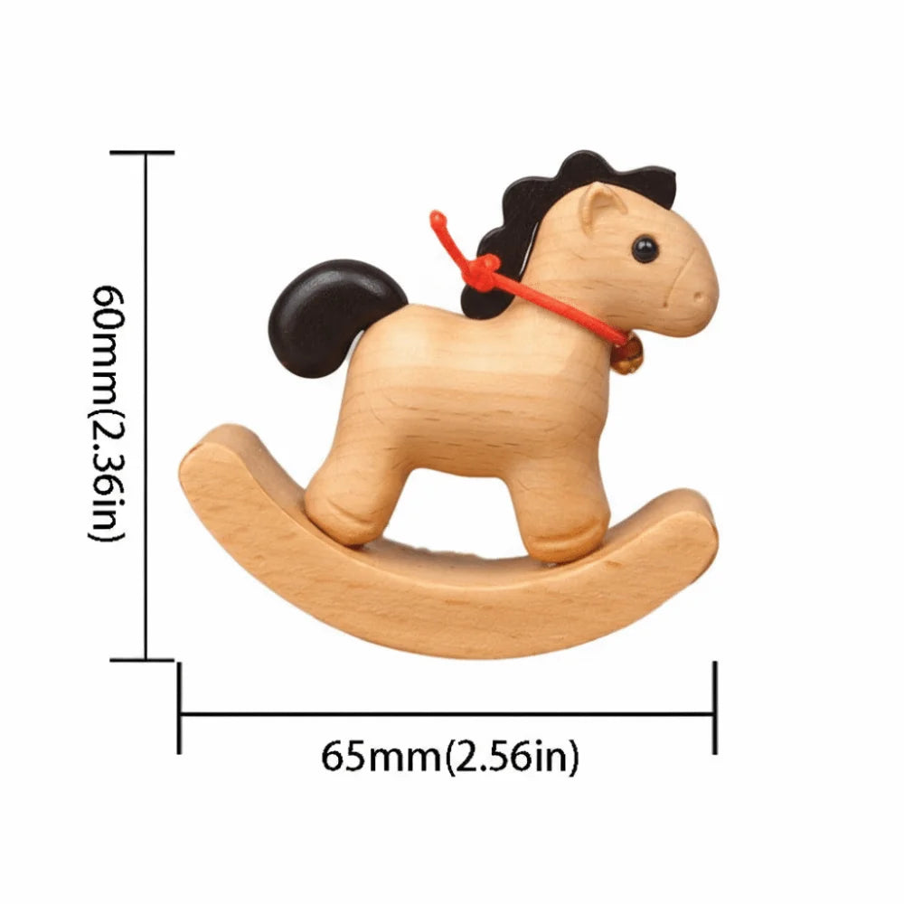 cheval bascule résine bois naturel couleur noire rouge cloche dorée décoration intérieure classique minimaliste