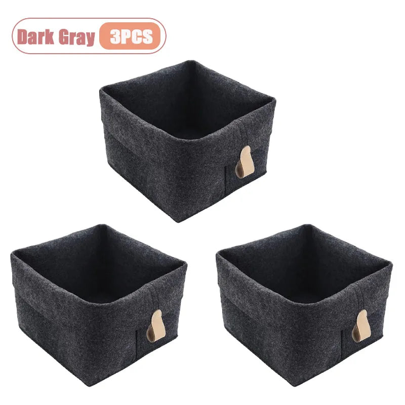 boîte rangement tissu veloutée gris clair foncée moderne pliable articles divers serviettes blanches broderie