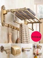 accessoires salle bain doré ornements sculptés finition brillante antique élégant porte serviettes savon toilette