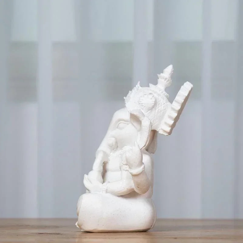 statue ganesha résine sculptée décorative religieuse éléphant fleurs blanches maison