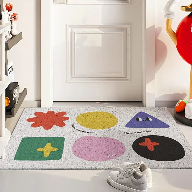 Paillasson décoratif aux motifs colorés et géométriques.