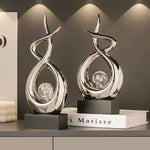 sculptures décoratives modernes résine transparente bulles inclusion blanc argenté base noire minimaliste