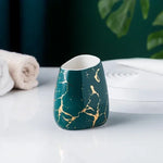 ensemble salle bain moderne marbre doré blanc distributeur savon porte brosse dents tasses plateaux