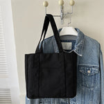 sac main noir beige moderne casual toile uni poche fermeture éclair poignées détachables