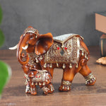 statue éléphant marron clair doré motifs ornements artisanat décoration intérieure chambre salon
