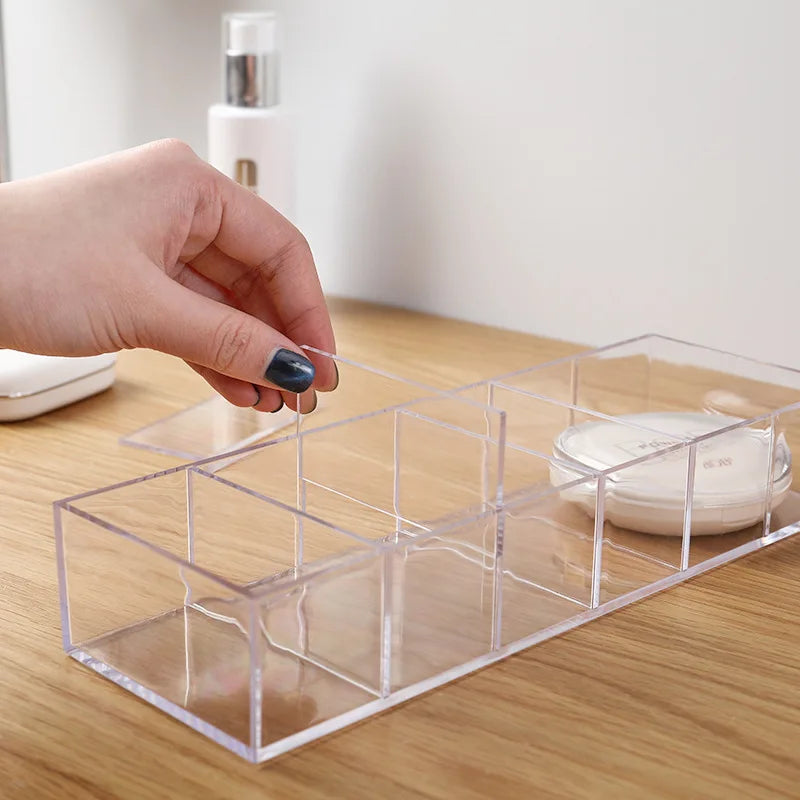 organisateur maquillage transparent moderne compartiments boîtes noires produits cosmétiques rangement chic adhésif
