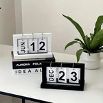 calendrier minimaliste moderne chiffres mobiles blanc noir gris clair occasion noël anniversaire mariage