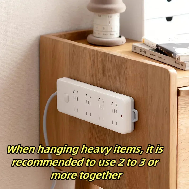 supports adhésifs blancs modernes télécommandes prises murales routeurs wifi minimalistes