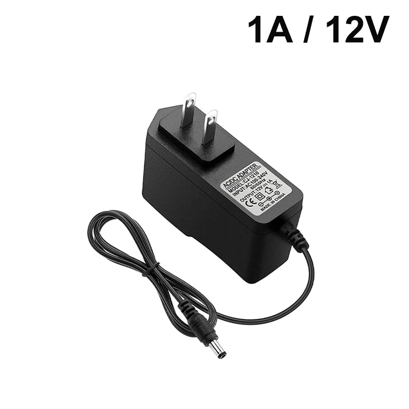 chargeur universel 12v 1a noir prise eu us mat moderne câble 92cm abs certifié