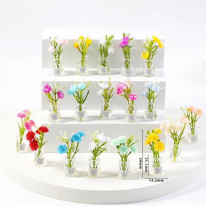 bouquets fleurs artificielles miniatures vases transparents couleurs variées décoration intérieure minimaliste
