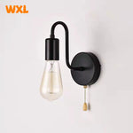 lampe murale moderne fer noir fixe 15cm largeur 18cm hauteur interrupteur ampoule