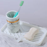 support savon silicone self draining moderne gris vert blanc rayures horizontales