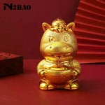 décoration intérieure statuettes chevaux dorées symboles chinois traditionnels ornements maison