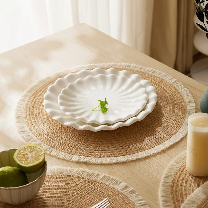 tapis table rond franges tissées beige blanc moderne respectueux environnement