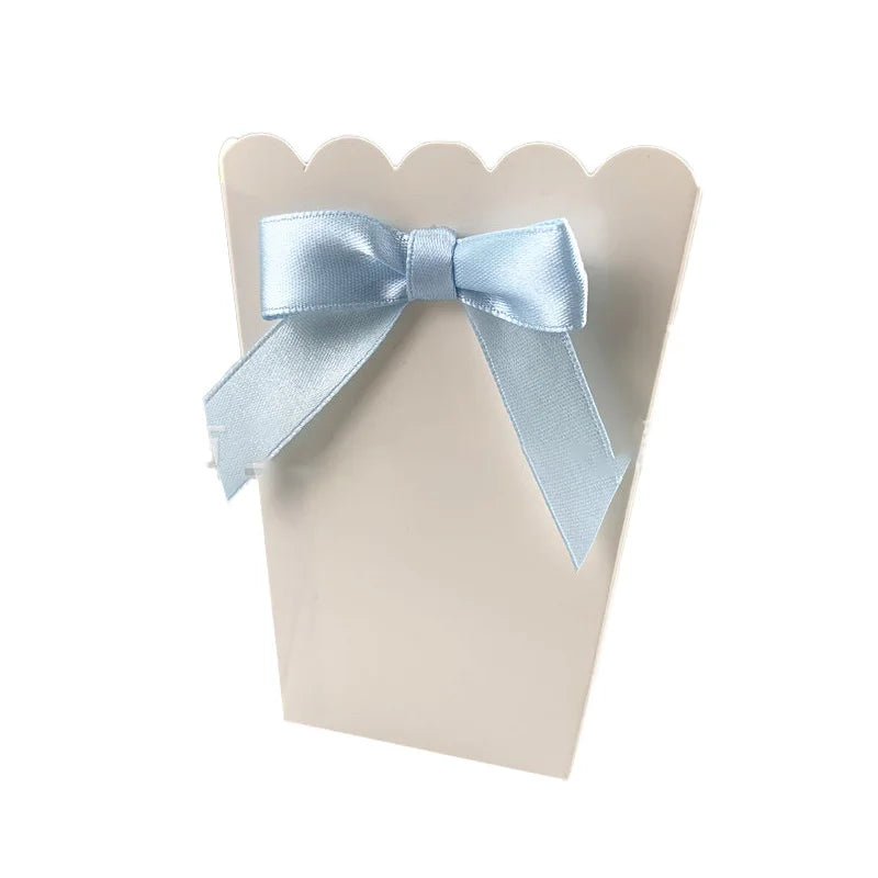 boîtes pop corn blanc rubans colorés classiques révélation sexe décoration fête anniversaire enfants filles