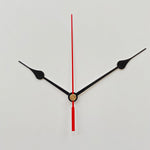 aiguilles horloge murales métal dorées noires blanches rouges modernes élégantes mouvement quartz fixations remplacent