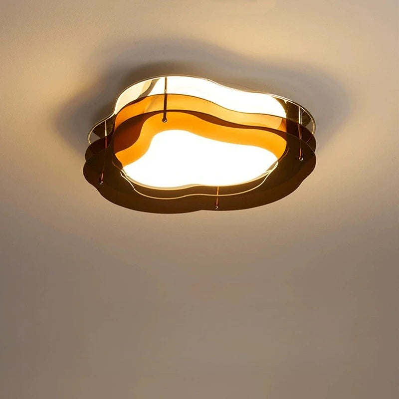 plafonnier led moderne ondulé transparent argenté fixations vis monté surface