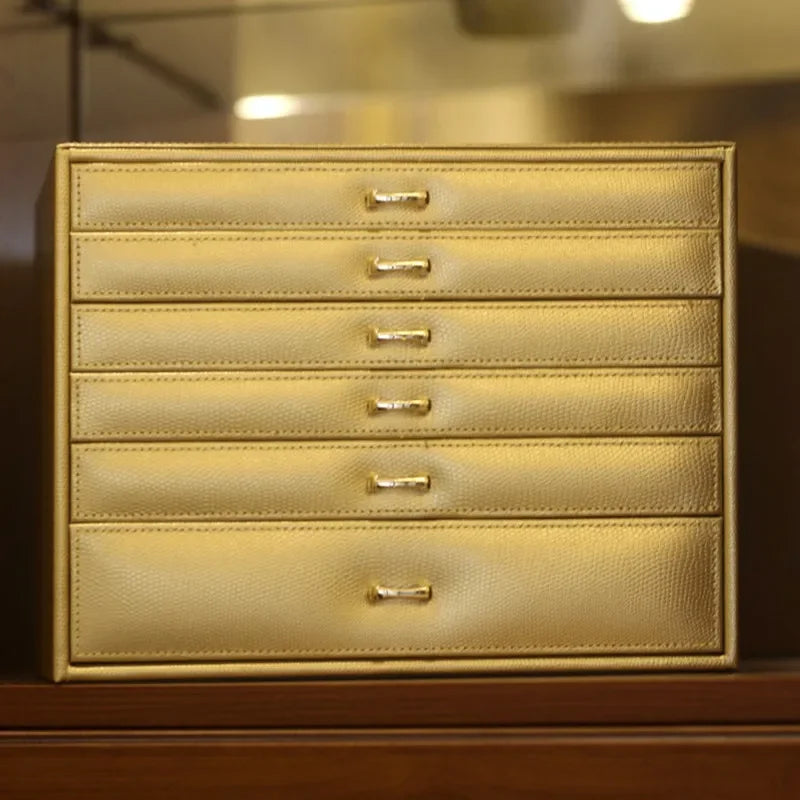 boîte bijoux cuir vert pastel compartiments velours classique poignées dorées grands bijoux rangement transporte
