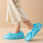 protège chaussures jetables non tissés bleu clair élastiques 100 pièces