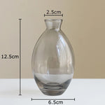 vases hydroponiques modernes transparents marron lisses décoration table plantes fleurs artificielles minimalistes