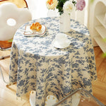 nappe ronde fleur bleue motif floral rustique franges table beige