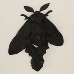 sculpture murale gothique relief noir visage papillon artisanal décoration intérieure unique chambre obscurité