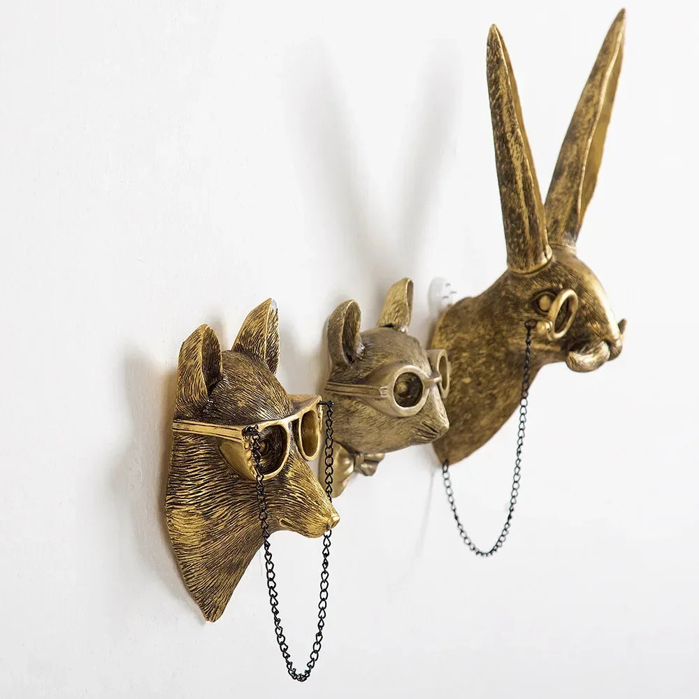 têtes animales décoratives modernes réaliste détail doré résine fixations lunettes cheminée