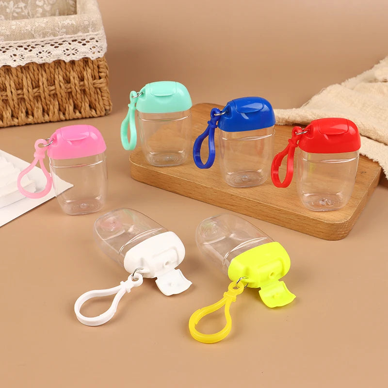 bouteille dispensation ovale transparente moderne bleu rose noir blanc jaune rechargeable anneau fixe couvercle